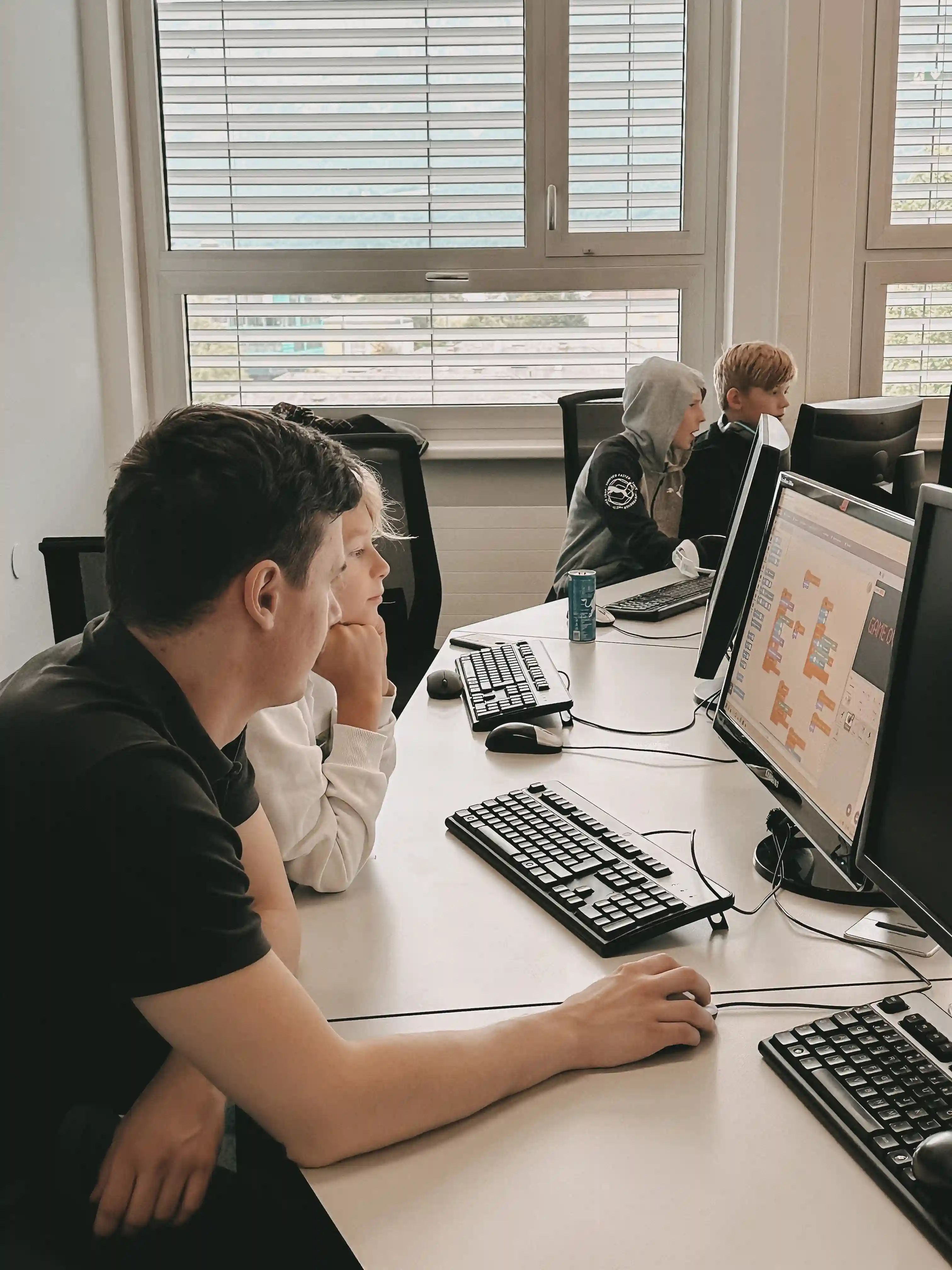 Chris teaching code for kids