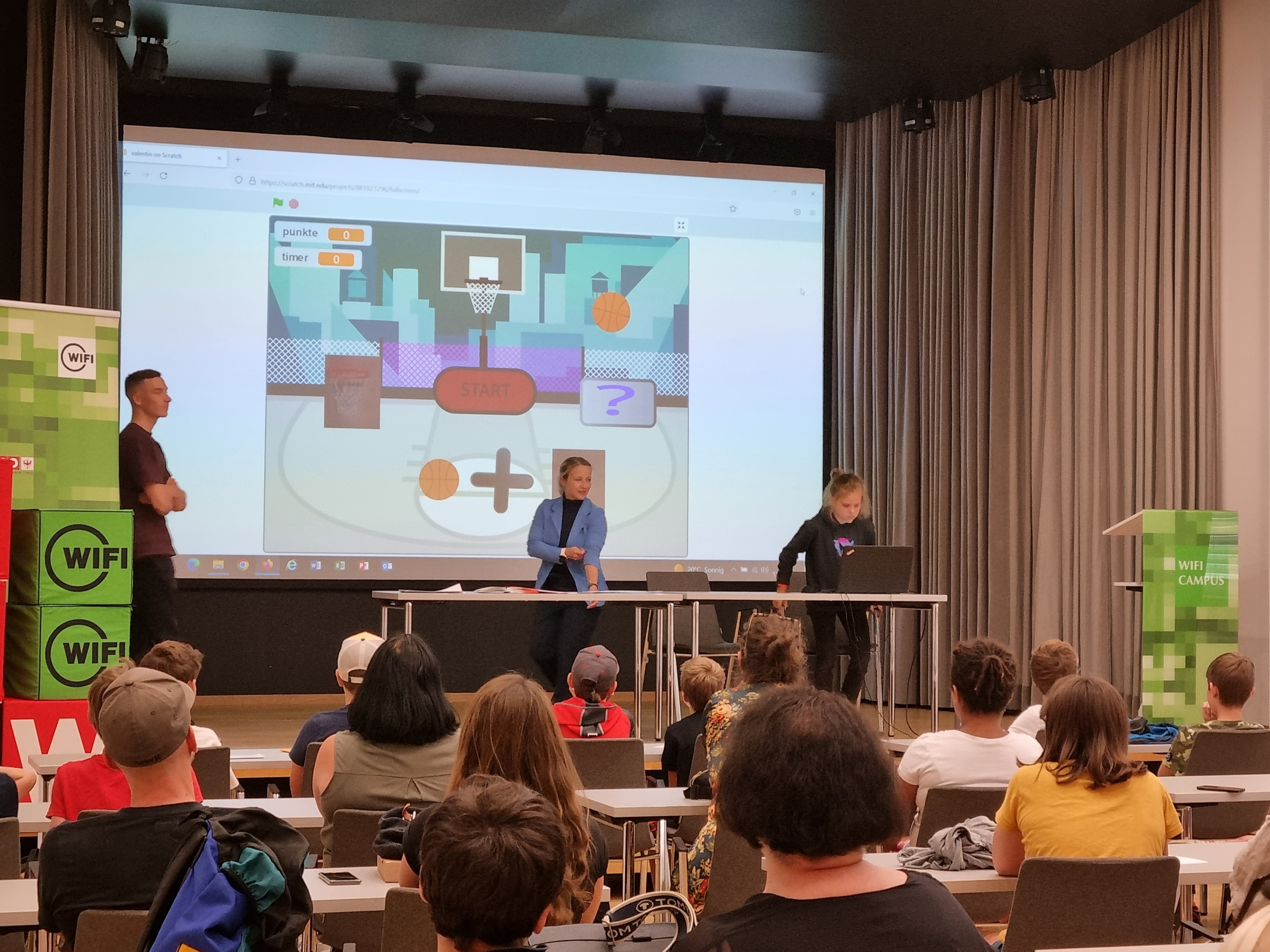 Full stage presentation to kids at Coding4Kids 2023