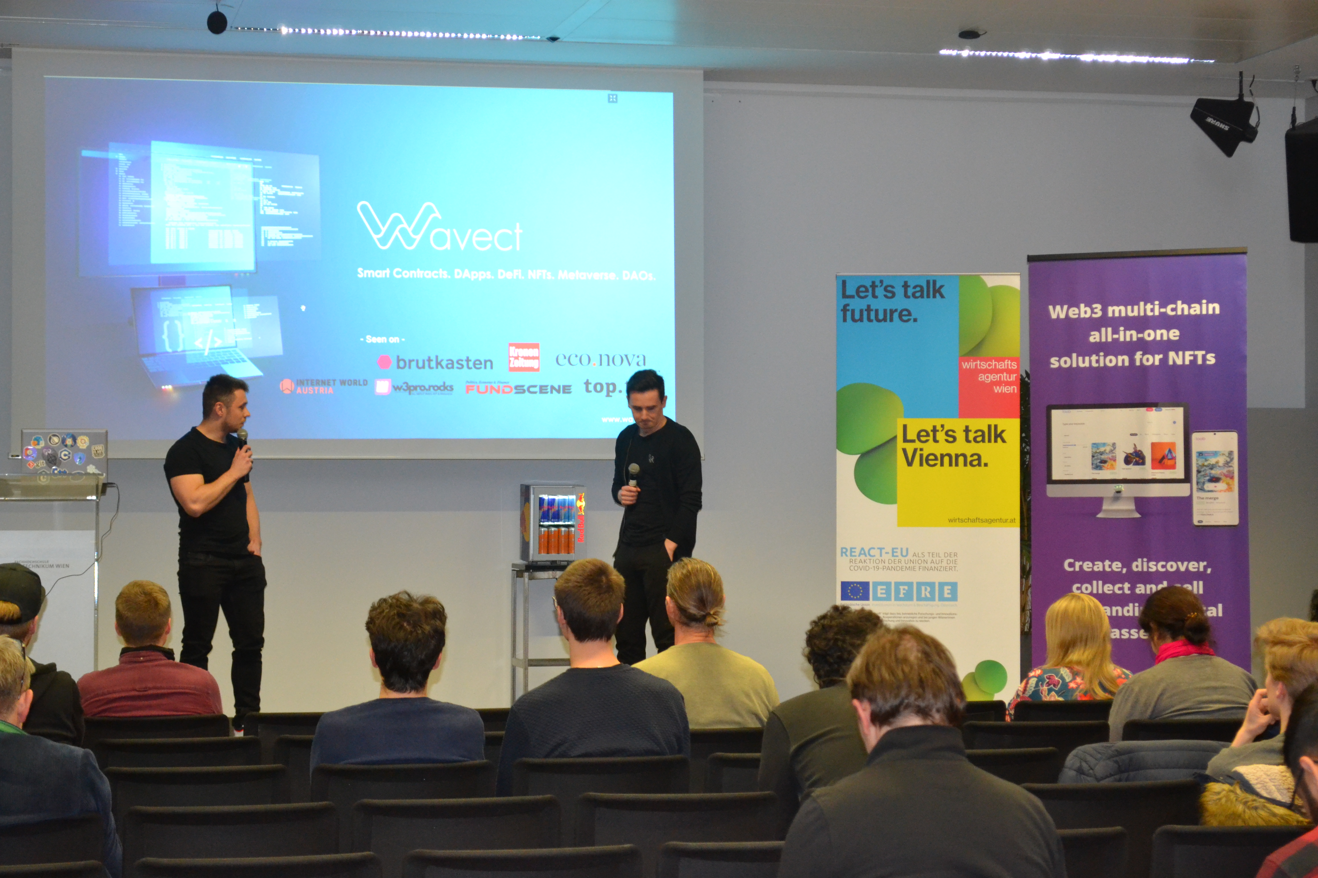 Kevin and Chris presenting together on stage at DLT Austria 2023