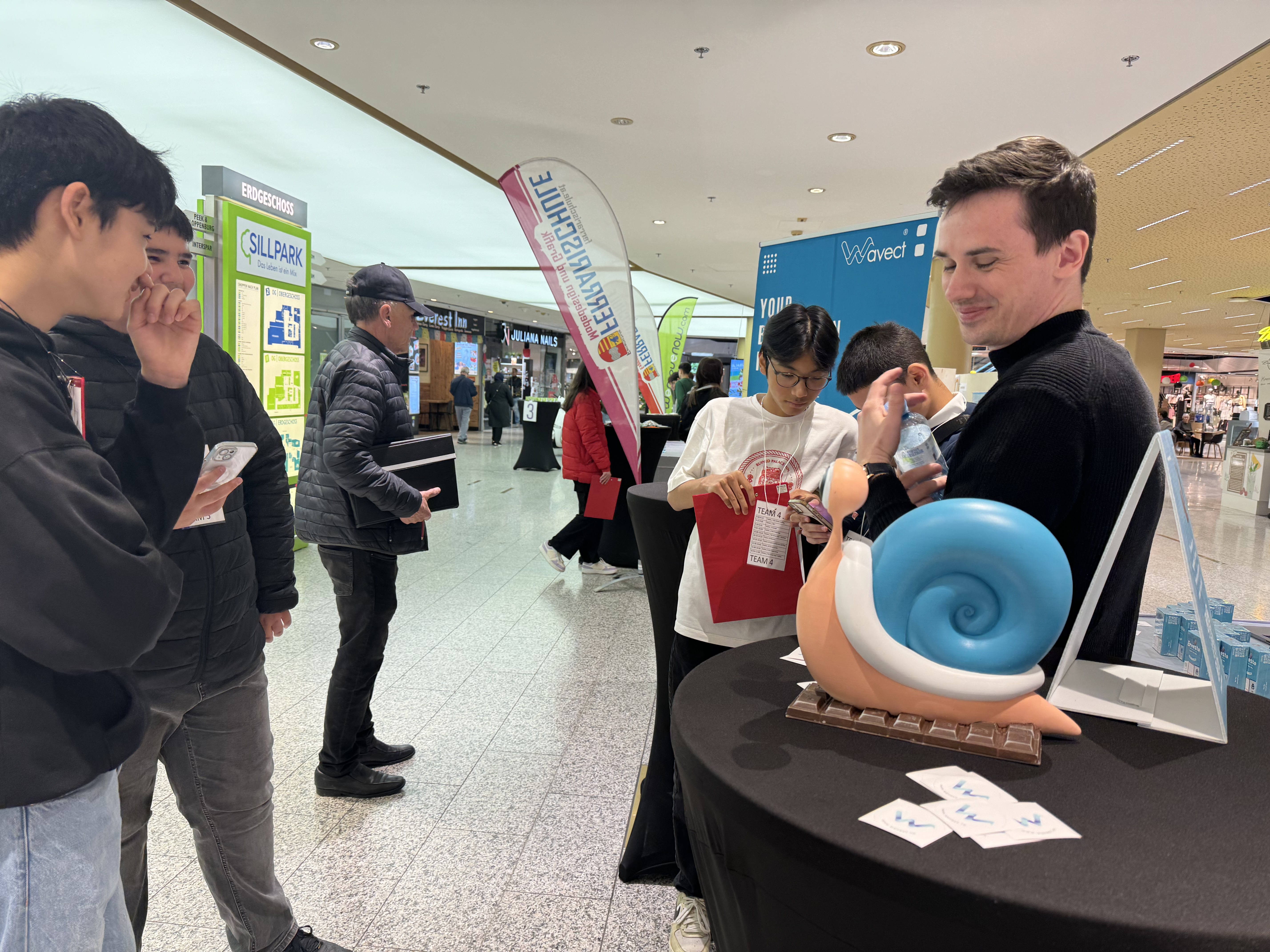 People engaging at Wavect booth at FutureDays 2024